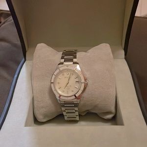 Classic Silver tone stainless steel womens watch.
